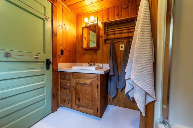 26 Don Gerry Rd, Bristol, NH 03222 - bathroom featuring vanity and wooden walls