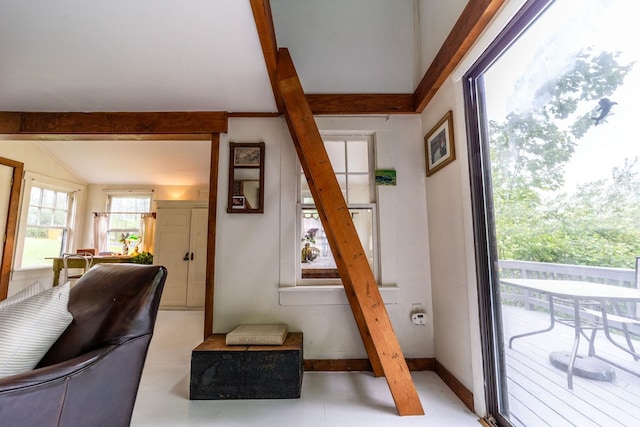 26 Don Gerry Rd, Bristol, NH 03222 - living room with vaulted ceiling, baseboards, and stairway