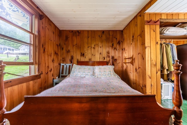 26 Don Gerry Rd, Bristol, NH 03222 - bedroom with wooden walls, multiple windows, and wood ceiling