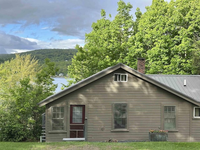 26 Don Gerry Rd, Bristol, NH 03222 - back of property featuring a chimney