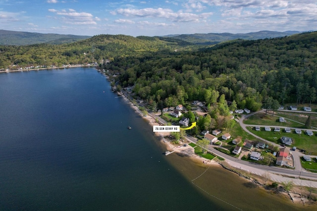 26 Don Gerry Rd, Bristol, NH 03222 - aerial view of property and surrounding area with a heavily wooded area and a water and mountain view