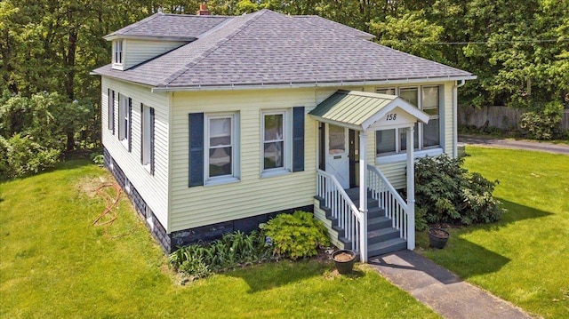 158 Clark Ave, Brattleboro, VT 05301 - view of front of house with roof with shingles and a front lawn