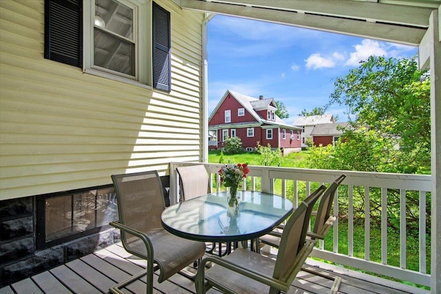 158 Clark Ave, Brattleboro, VT 05301 - wooden deck with outdoor dining area and a residential view