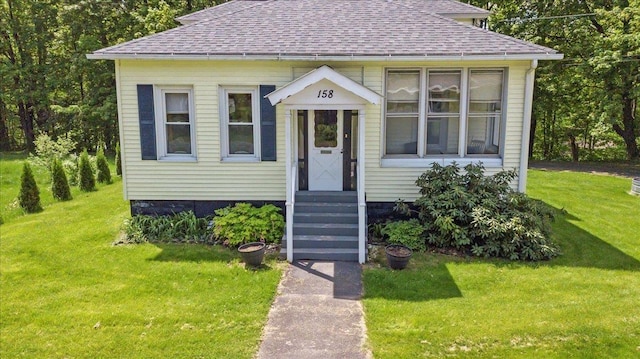 158 Clark Ave, Brattleboro, VT 05301 - view of front of property with a shingled roof and a front lawn