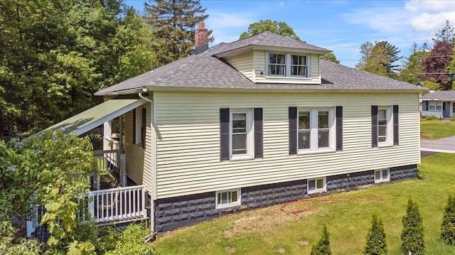 158 Clark Ave, Brattleboro, VT 05301 - view of side of property with a chimney, a yard, and roof with shingles