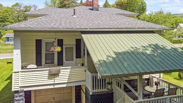158 Clark Ave, Brattleboro, VT 05301 - rear view of property with a shingled roof, stairway, a chimney, and a standing seam roof