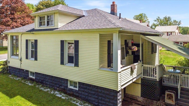 158 Clark Ave, Brattleboro, VT 05301 - view of home's exterior with roof with shingles and a chimney