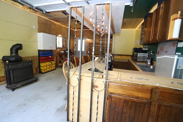 78 Daniels Pond Rd, Glover, VT 05839 - kitchen with concrete floors and light countertops