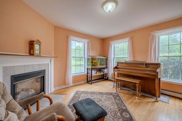5 Saw Hill Rd, Hooksett, NH 03106 - living area featuring wood finished floors, a tile fireplace, and baseboards