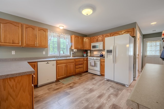 5 Saw Hill Rd, Hooksett, NH 03106 - kitchen with white appliances, a sink, light wood-type flooring, and light countertops