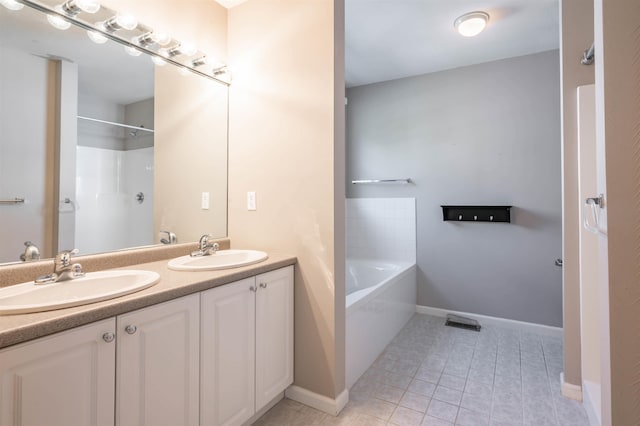 3 Harvest Ln, Nashua, NH 03063 - full bathroom with double vanity, a tub to relax in, tile patterned flooring, a shower, and baseboards