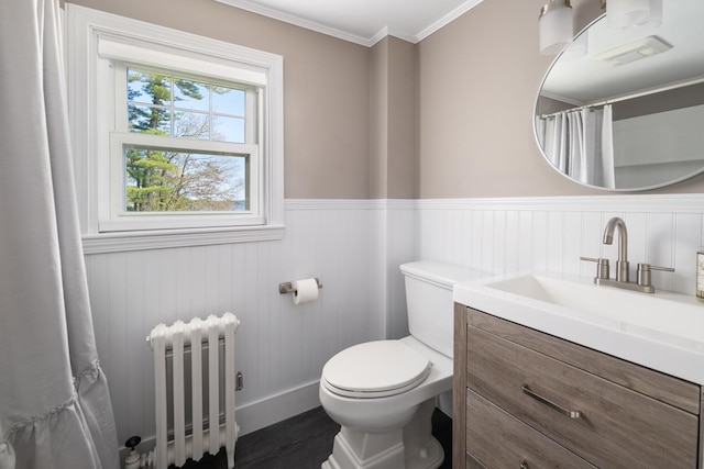 354 Dover Point Rd, Dover, NH 03820 - full bath featuring radiator, vanity, a wainscoted wall, toilet, and wood finished floors