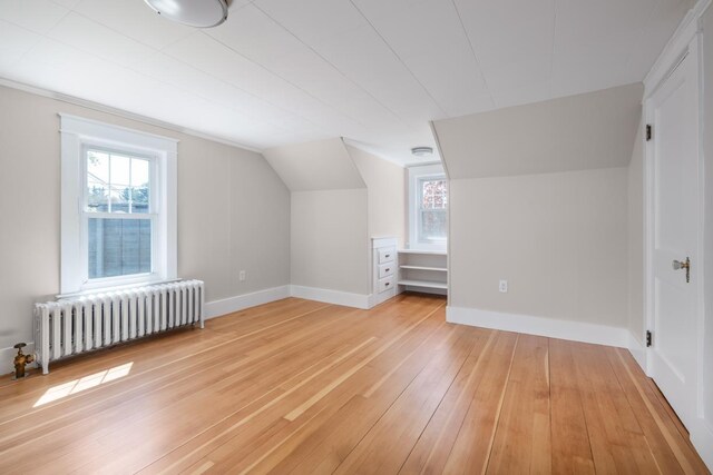 354 Dover Point Rd, Dover, NH 03820 - additional living space featuring radiator heating unit, light wood finished floors, lofted ceiling, and baseboards