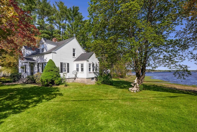354 Dover Point Rd, Dover, NH 03820 - view of home's exterior featuring a water view, a yard, and a chimney