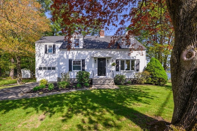 354 Dover Point Rd, Dover, NH 03820 - cape cod home with a chimney, asphalt driveway, an attached garage, and a front yard