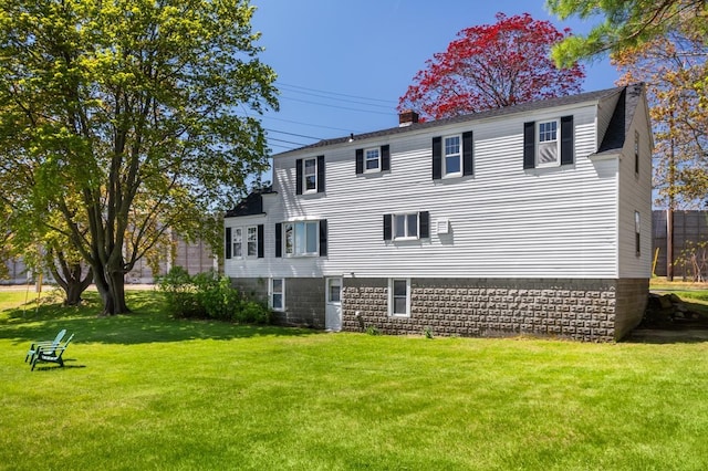 354 Dover Point Rd, Dover, NH 03820 - rear view of house with a yard