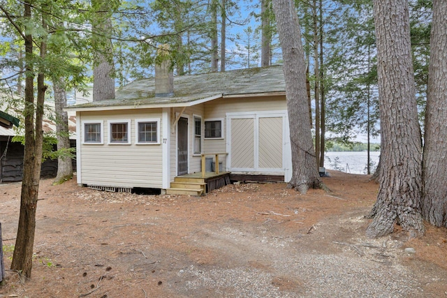 17 Hayes Ln, Acton, ME 04001 - view of front facade featuring a water view and a chimney