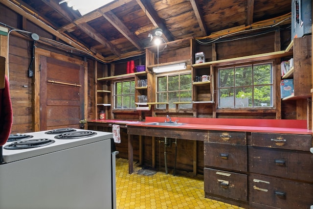 17 Hayes Ln, Acton, ME 04001 - kitchen featuring white electric range, open shelves, wood walls, a sink, and plenty of natural light