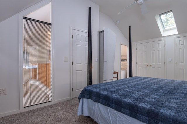31 Plumley Ave, Ludlow, VT 05149 - carpeted bedroom with a skylight, vaulted ceiling, two closets, and a ceiling fan