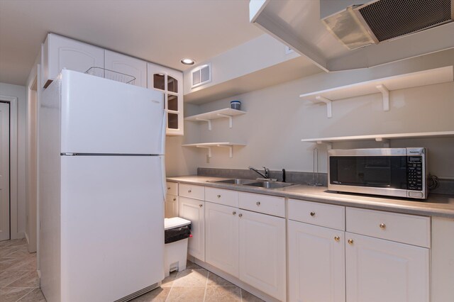 31 Plumley Ave, Ludlow, VT 05149 - kitchen featuring open shelves, freestanding refrigerator, stainless steel microwave, a sink, and recessed lighting