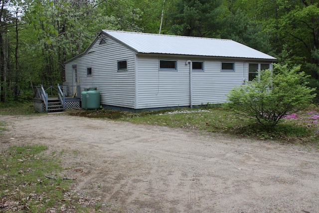 86 Concord Ln, Wakefield, NH 03830 - view of outbuilding with a forest view