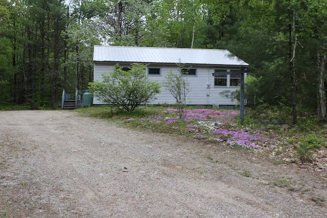 86 Concord Ln, Wakefield, NH 03830 - view of front of home with metal roof