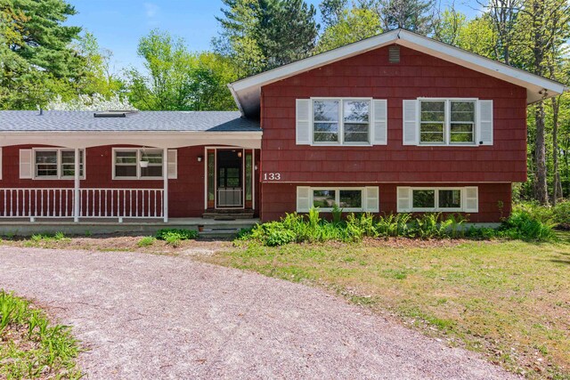 133 Pine Meadow Dr, Colchester, VT 05446 - tri-level home featuring a shingled roof