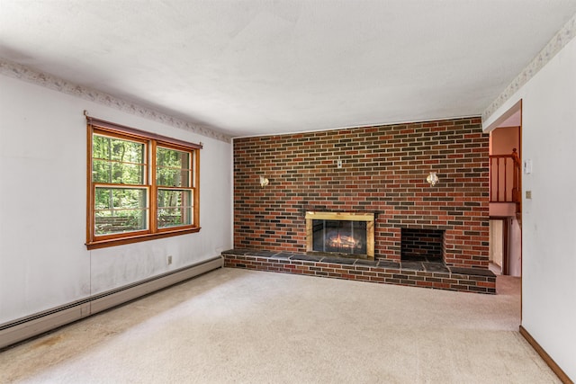 133 Pine Meadow Dr, Colchester, VT 05446 - unfurnished living room with a baseboard radiator, carpet floors, and a fireplace