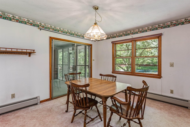 133 Pine Meadow Dr, Colchester, VT 05446 - dining room featuring light colored carpet, a baseboard heating unit, a chandelier, and baseboards