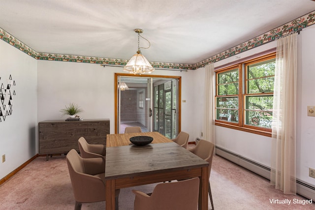 133 Pine Meadow Dr, Colchester, VT 05446 - dining area with a chandelier, light carpet, a baseboard heating unit, and baseboards