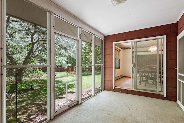 133 Pine Meadow Dr, Colchester, VT 05446 - unfurnished sunroom featuring baseboard heating