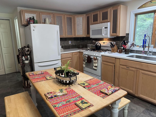220 Foggs Ridge Rd, Ossipee, NH 03864 - kitchen featuring white appliances, a sink, light countertops, decorative backsplash, and glass insert cabinets
