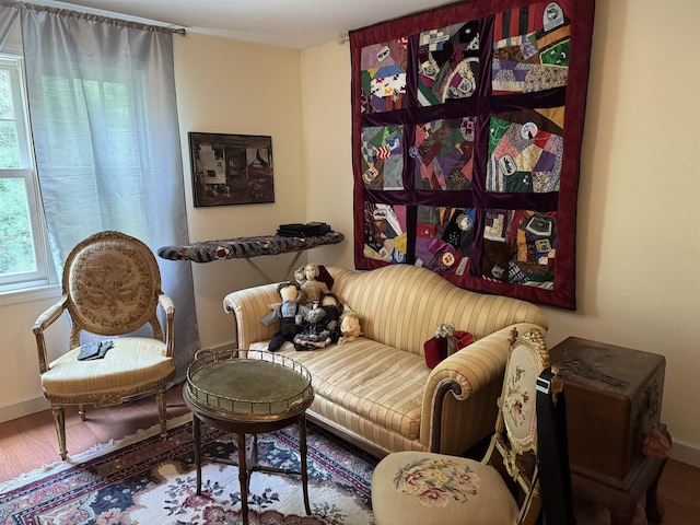 220 Foggs Ridge Rd, Ossipee, NH 03864 - sitting room with wood finished floors and baseboards