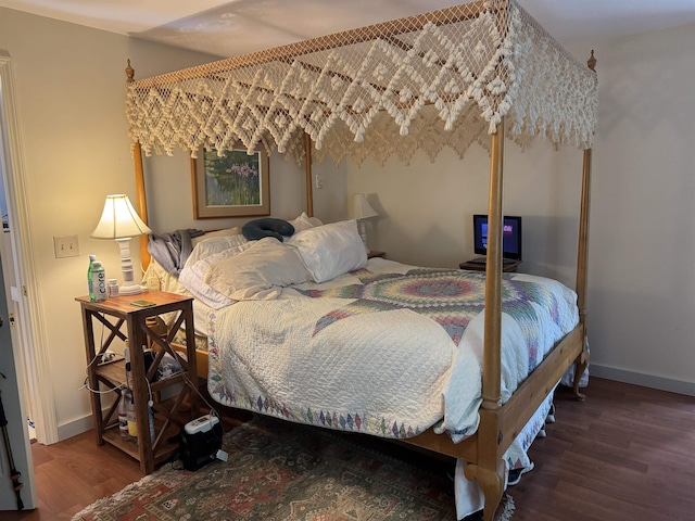 220 Foggs Ridge Rd, Ossipee, NH 03864 - bedroom with wood finished floors and baseboards