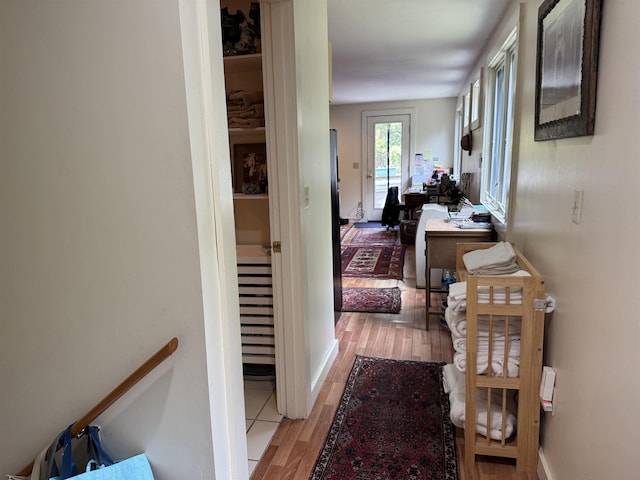 220 Foggs Ridge Rd, Ossipee, NH 03864 - hallway featuring light wood-style flooring and baseboards