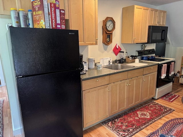 220 Foggs Ridge Rd, Ossipee, NH 03864 - kitchen featuring black appliances, a sink, light brown cabinets, and light wood-type flooring
