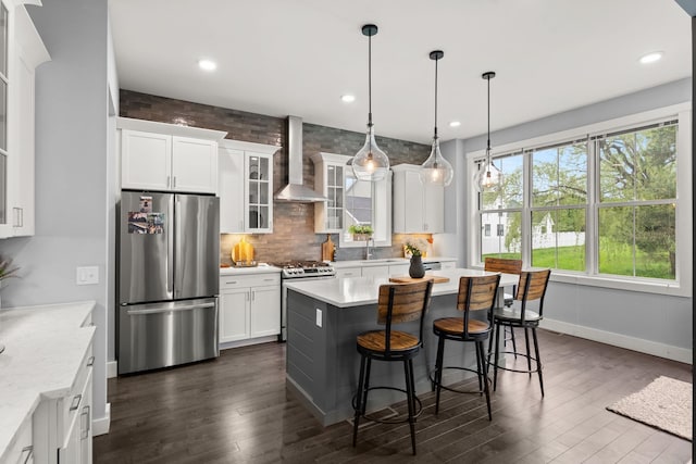 36 Caspian Ln, Shelburne, VT 05482 - kitchen with stainless steel appliances, wall chimney exhaust hood, a sink, dark wood-style flooring, and recessed lighting