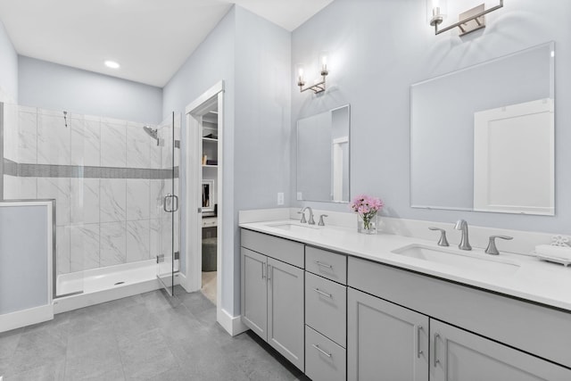 36 Caspian Ln, Shelburne, VT 05482 - bathroom featuring double vanity, a shower stall, and baseboards