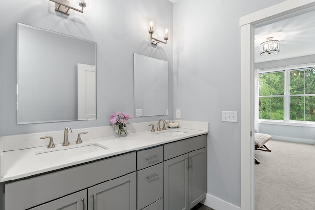 36 Caspian Ln, Shelburne, VT 05482 - bathroom with double vanity and baseboards