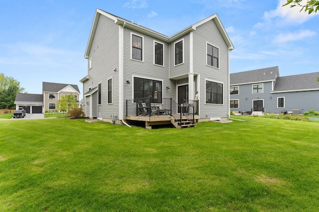 36 Caspian Ln, Shelburne, VT 05482 - rear view of property featuring a wooden deck and a lawn