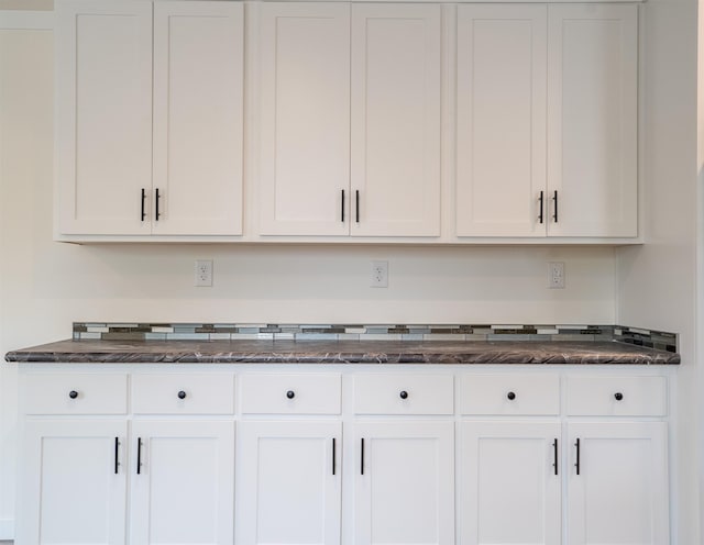 26 Deerfield Ct, Rochester, NH 03868 - kitchen featuring white cabinets and dark stone counters