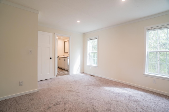 26 Deerfield Ct, Rochester, NH 03868 - unfurnished room with healthy amount of natural light, light carpet, recessed lighting, baseboards, and crown molding
