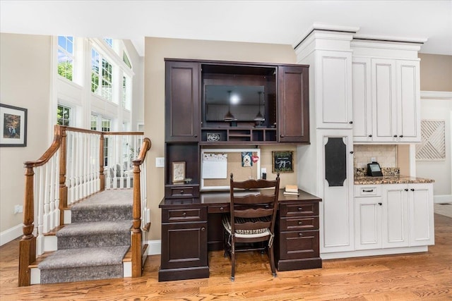 72 Settlers Ct, Bedford, NH 03110 - office area with light wood-type flooring, baseboards, and built in study area