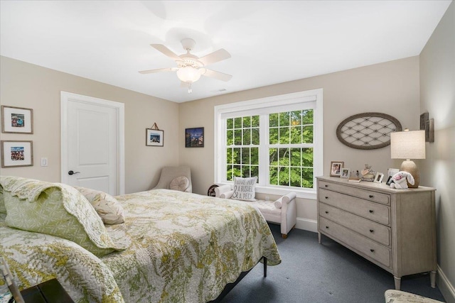 72 Settlers Ct, Bedford, NH 03110 - bedroom featuring dark colored carpet, baseboards, and a ceiling fan