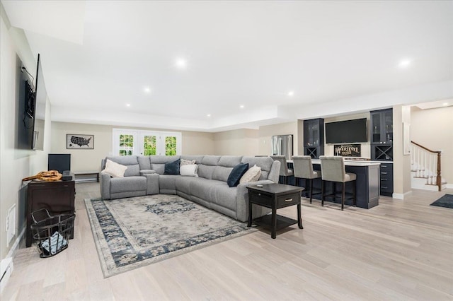 72 Settlers Ct, Bedford, NH 03110 - living room with stairs, light wood-style floors, recessed lighting, and baseboards