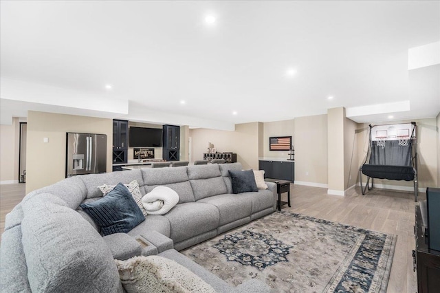 72 Settlers Ct, Bedford, NH 03110 - living room with light wood-style floors, baseboards, and recessed lighting