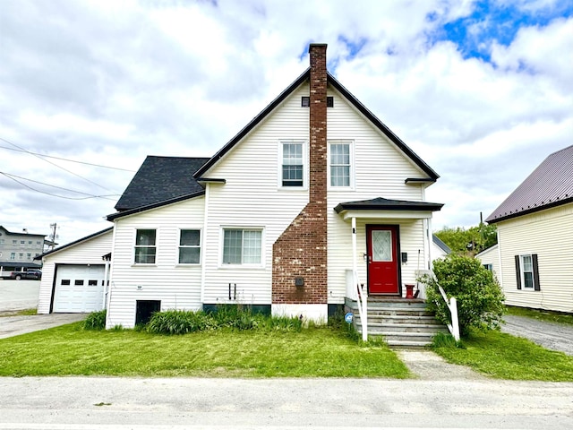 15 Park St, Colebrook, NH 03576 - view of front of property with a chimney, concrete driveway, an attached garage, roof with shingles, and a front yard