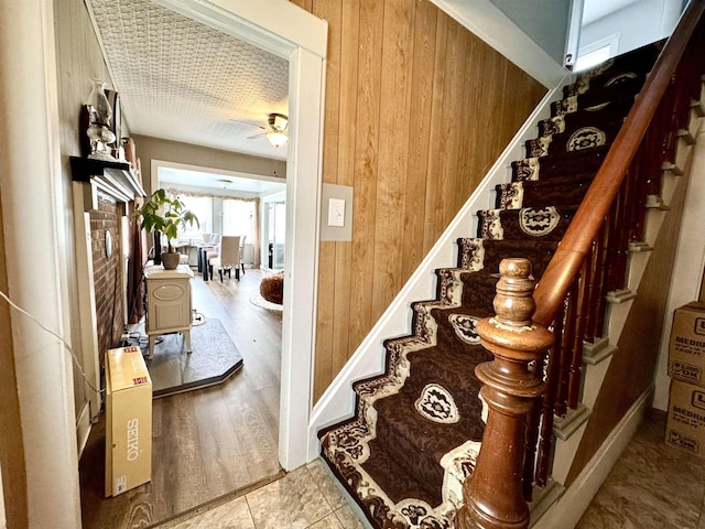 15 Park St, Colebrook, NH 03576 - stairway with wooden walls and a ceiling fan
