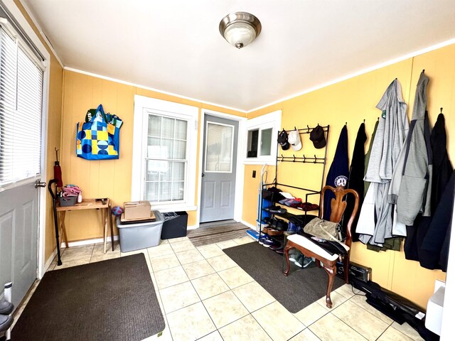 15 Park St, Colebrook, NH 03576 - mudroom with tile patterned flooring and ornamental molding