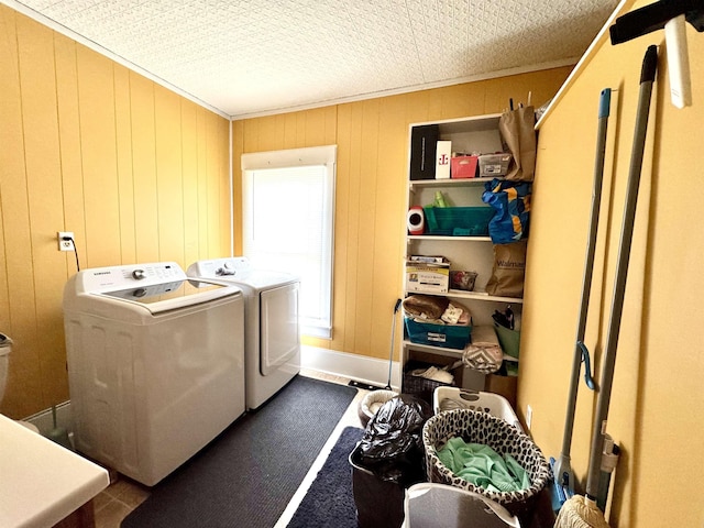 15 Park St, Colebrook, NH 03576 - laundry room featuring washing machine and dryer and wooden walls